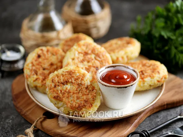 Фото готового блюда: Котлеты из минтая с рисом в духовке