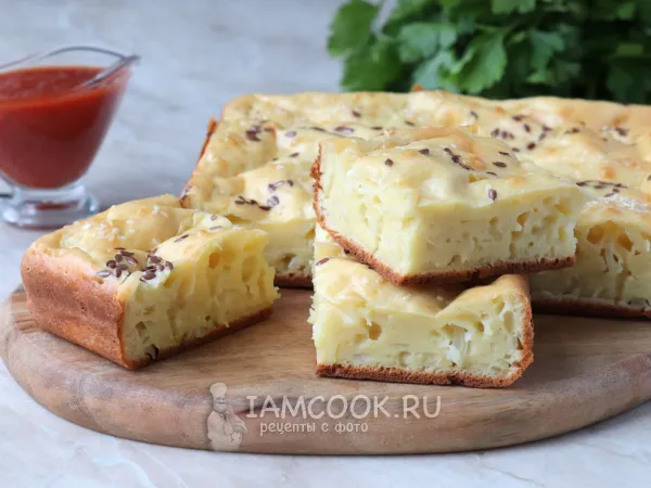 Фото готового блюда: Заливной пирог с капустой на кефире и майонезе