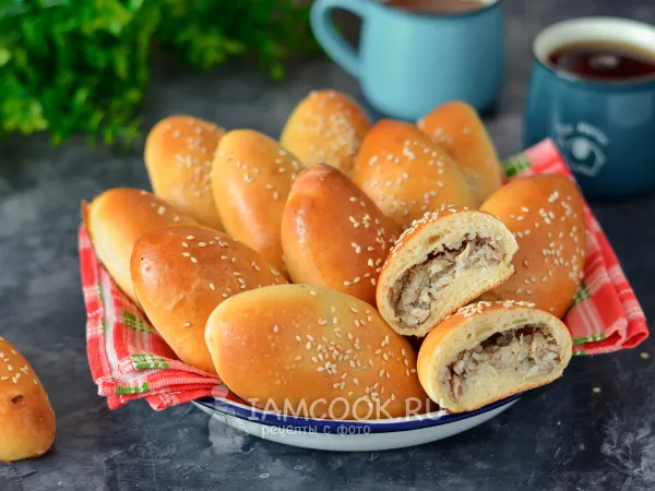 Фото готового блюда: Пирожки с рыбными консервами и рисом