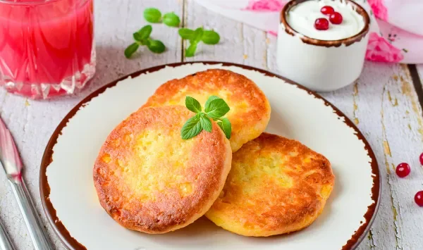 Фото блюда: Сырники с тыквой и творогом в духовке