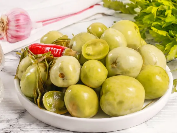 Фото блюда: Соленые зеленые помидоры на зиму холодным способом